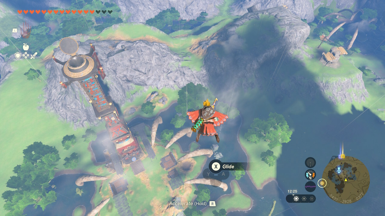 Link flying next to the Rabella Wetlands Skyview Tower in Zelda: Tears of the Kingdom