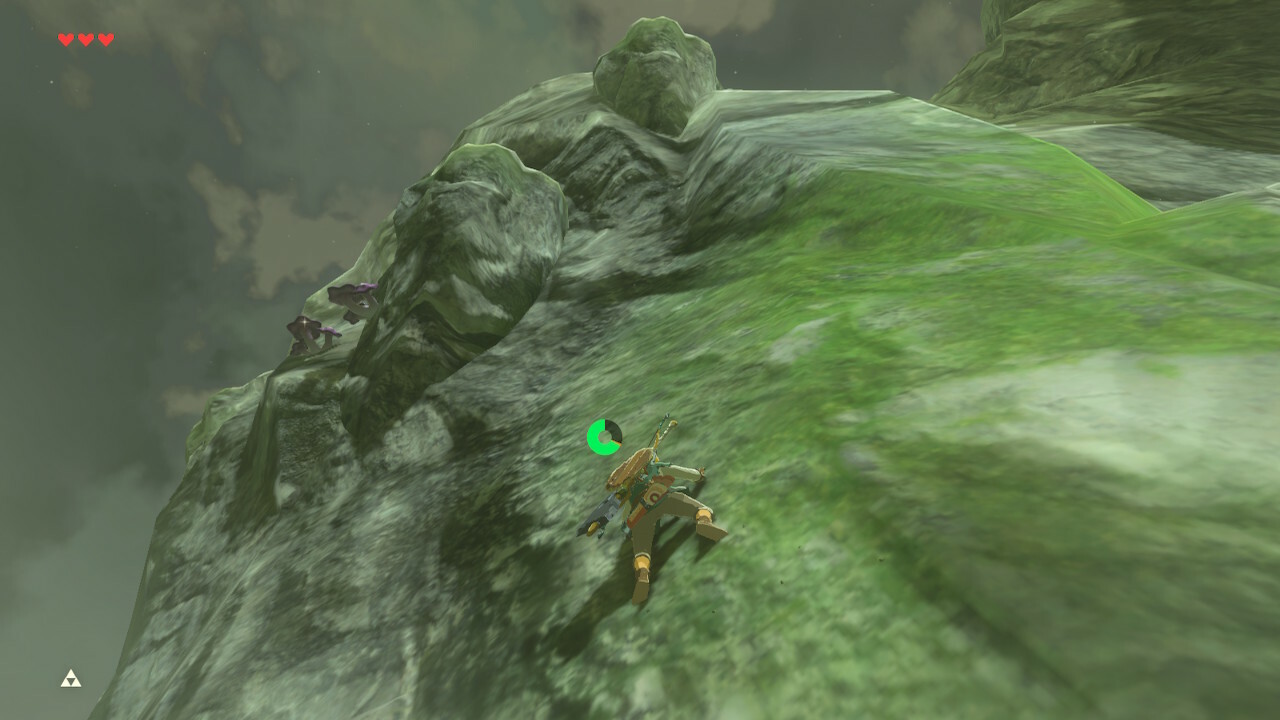 Link climbing a mountain in Zelda Breath of the Wild