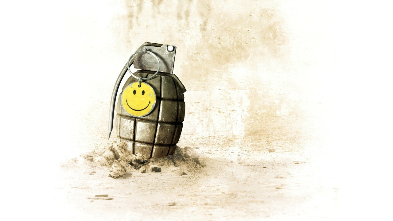 Battlefield Bad Company keyart featuring a grenade with a smiley pin