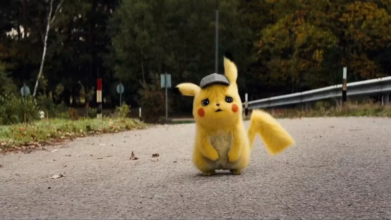 Pikachu from the first Pikachu movie standing on a road with a sad face