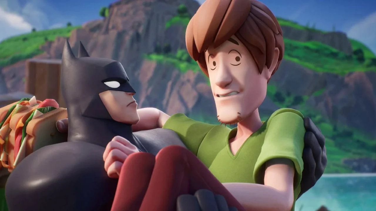 MultiVersus Autopartida: Batman sosteniendo a Shaggy, que está sosteniendo un sándwich