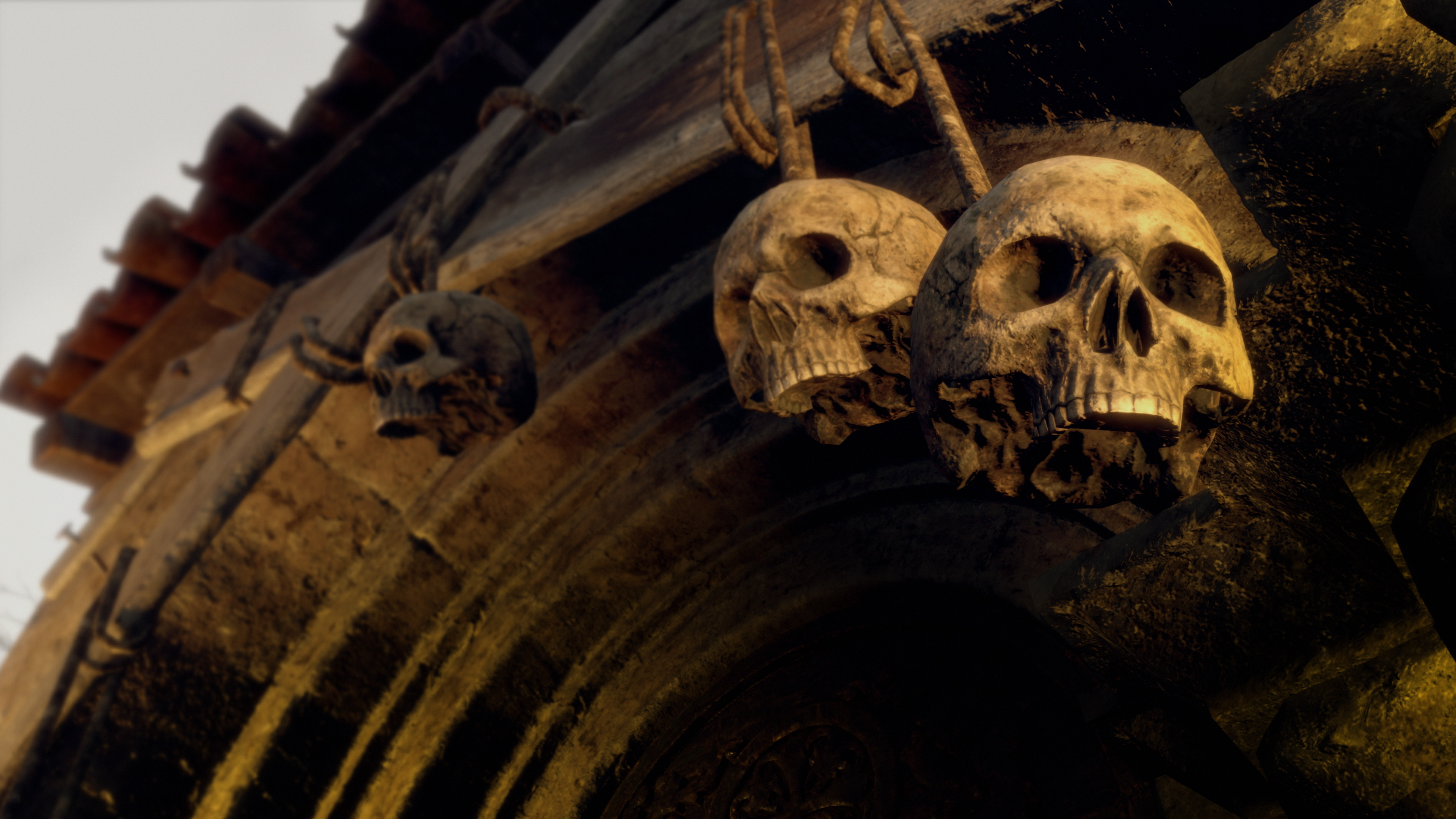 Resident Evil 4 village skulls hanging from church