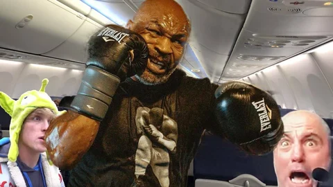 Mike tyson punch rogan paul