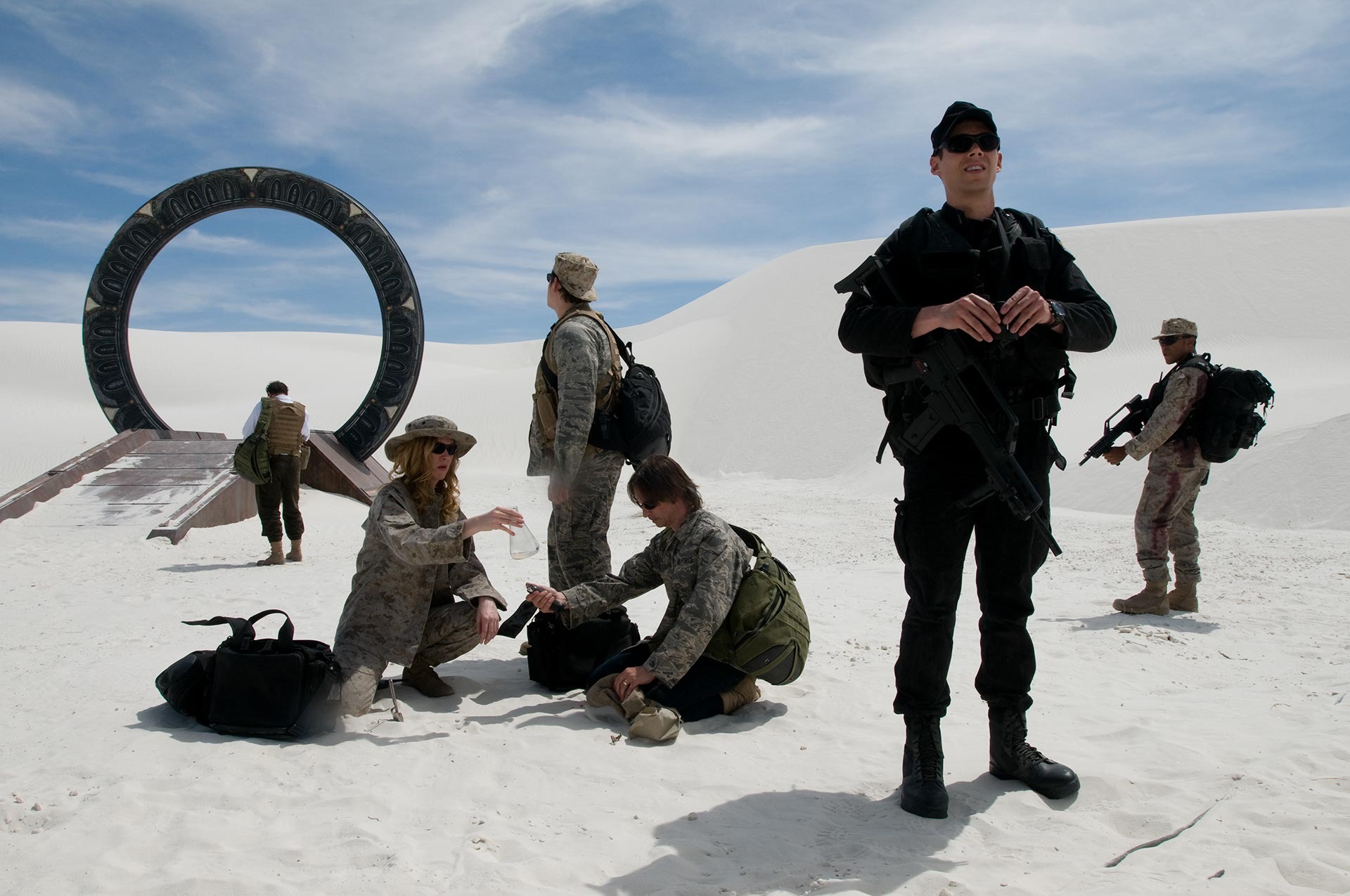 Stargate Universe military squad on desert planet