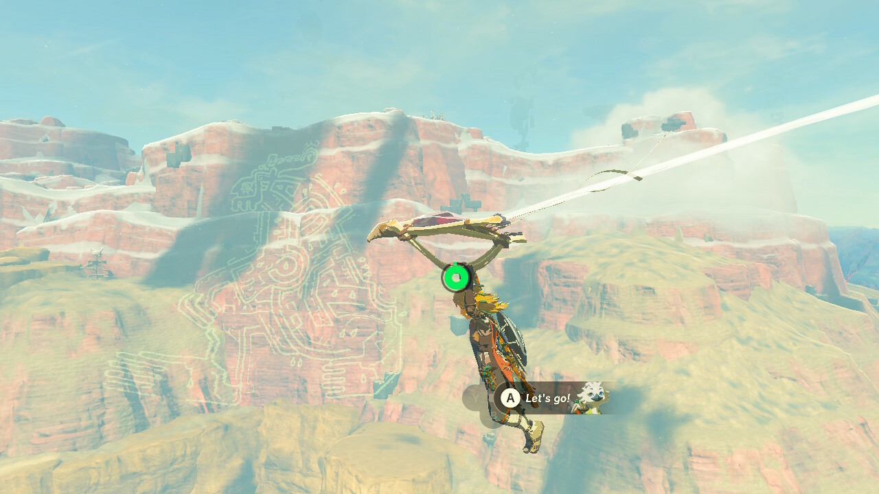 Link flying with glider beside a snowy Geoglyph mountain